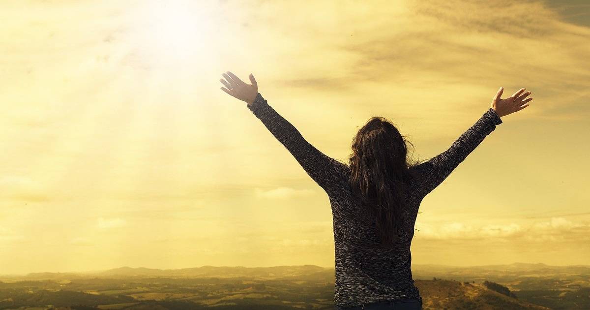 this is a picture to represent a woman who has found happiness after treatment of cancer through the phenomenon of posttraumatic growth