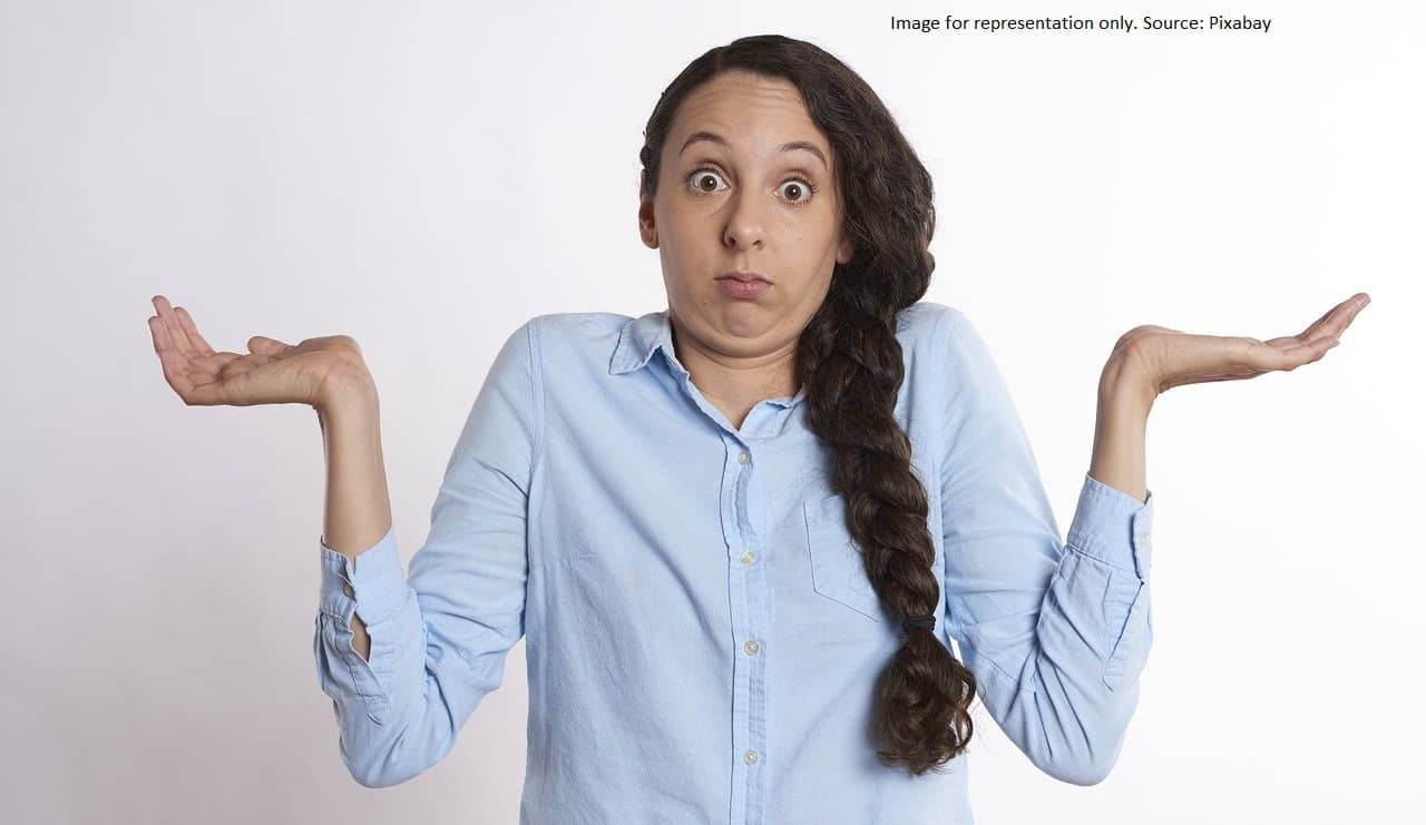 this is an image of a woman confused. It is used as a featured image to represent the questions after cancer surgery that patients have regarding need for further treatment. For an article by Dr Suraj Manjunath, best cancer surgeon/surgical oncologist, Bangalore
